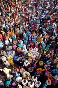 Worshippers have just begun a three-hour parade, to welcome the annual Sikh festival of Vaisakhi. This is an ancient harvest festival in the Punjab region of India and commemorates the founding of the Sikh nation in 1699. It also marks the Hindu solar New Year and is observed by people of different faiths across the sub-continent. Leicester's annual Sikh Vaisakhi parade normally attracts around 30,000 worshippers from all around the UK. It has grown enormously since it started in 1986 with a gathering of less than 1,000 Sikhs. The parade begins at about 11am at the Guru Nanak Gurdwara, which is located on a street named Holy Bones, since there is a church and graveyard adjacent to the temple. The Gurdwara normally see more than 1000 worshippers a day, either paying their respect for a few minutes to offering sewa (selfless service) through cleaning, cooking, serving food, prayers and much more. Through this image and my wider body of work, I am keen to explore a community, in which individuals come together and work towards a collective goal. Leicester is a place where sophistication and tradition is continuing and being reinvented at every turn.