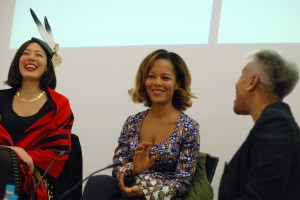Photograph of Migration and Fashion speakers in conversation - Awon and Hazel laughing.