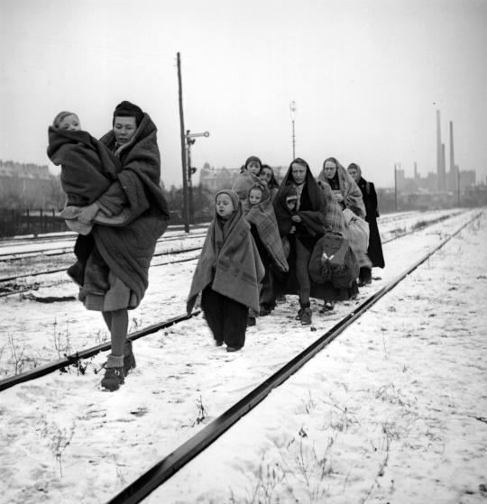 A handful of survivors from the 150 refugees who left Lodz in Poland two months earlier headed for Berlin. They are following railway lines on the outskirts of Berlin in the hope of being picked up by a British train. (Photo by Fred Ramage/Getty Images)